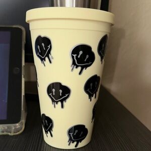 Yellow Tumbler with Black Dripping Smiley Faces